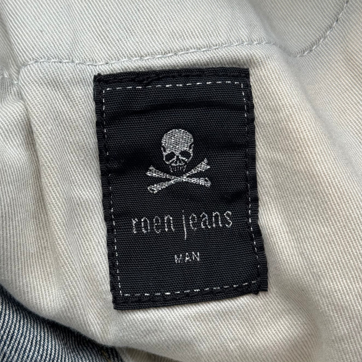 roen 2000s double skull pocket distressed denim jeans