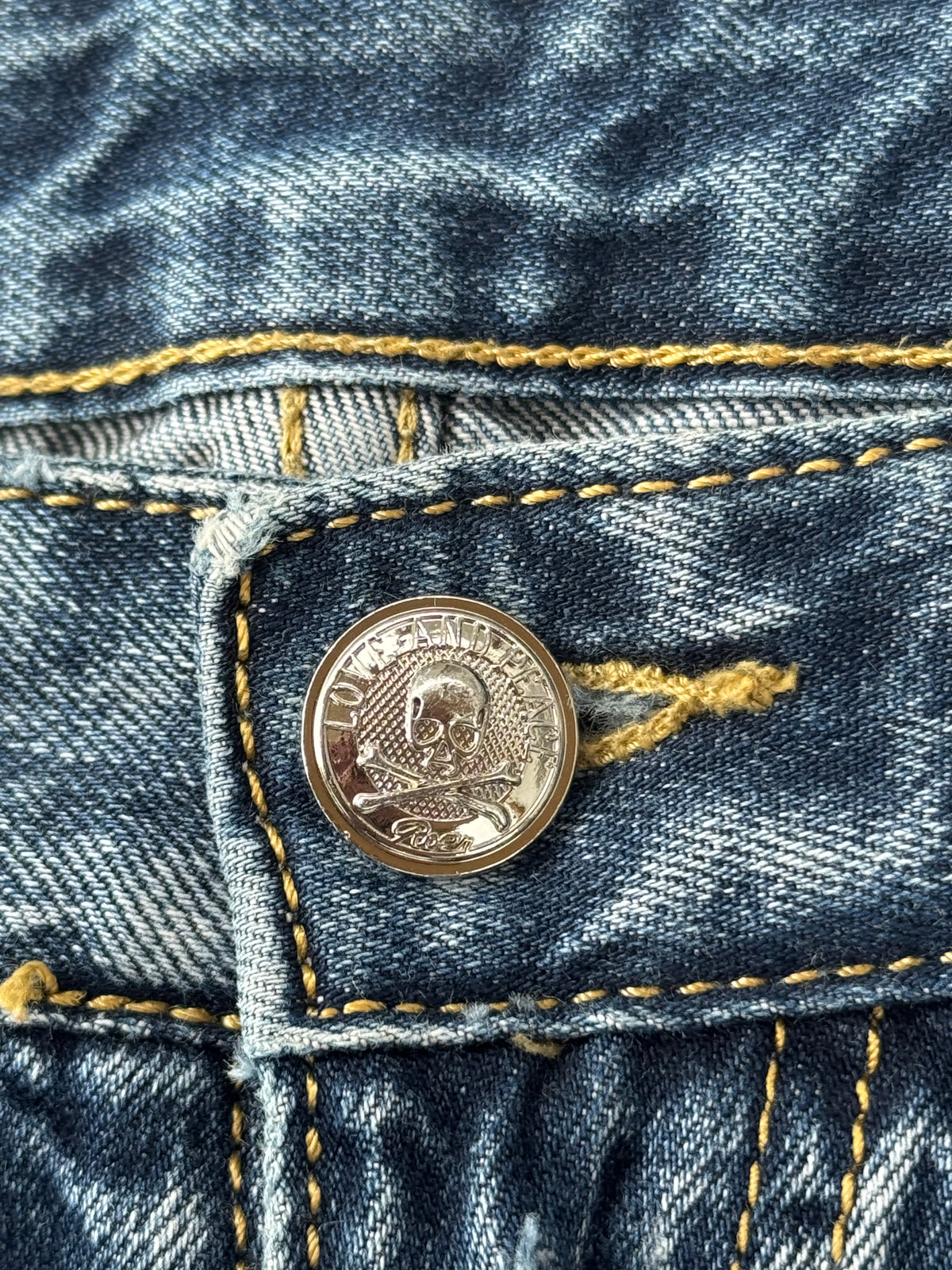 roen 2000s double skull pocket distressed denim jeans